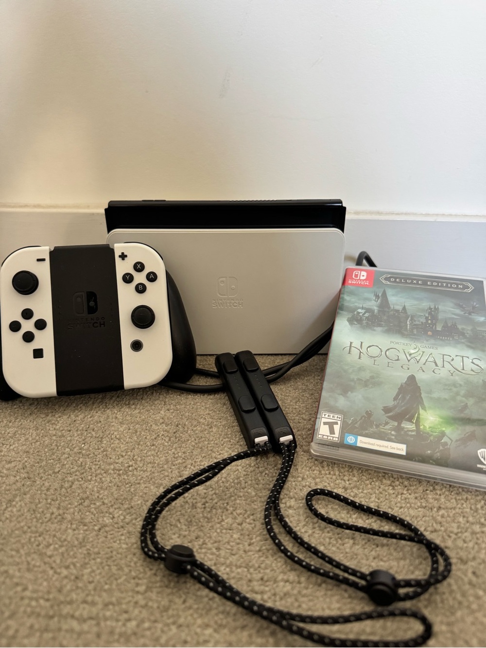 Nintendo Switch OLED Console in White with Black Accents and Hogwarts Legacy